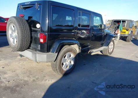2011 Jeep Wrangler Unlimited Sahara from USA, damaged, VIN 1J4BA5H11BL572173